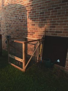 how do i set up a composting system in my backyard
